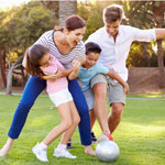 Family playing outdoor games